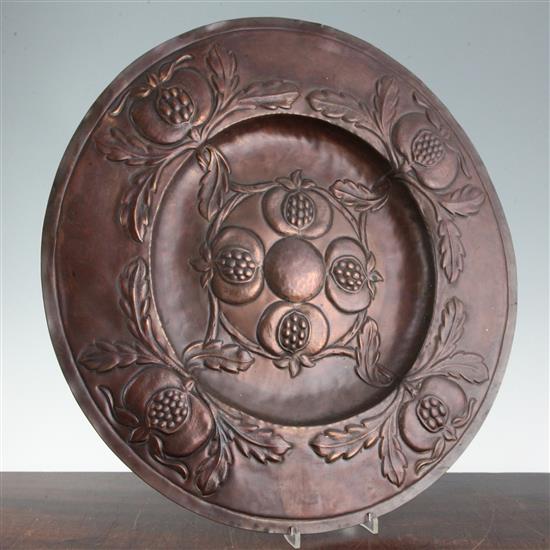 An Arts & Crafts embossed copper charger, probably Newlyn, 20in.(-)